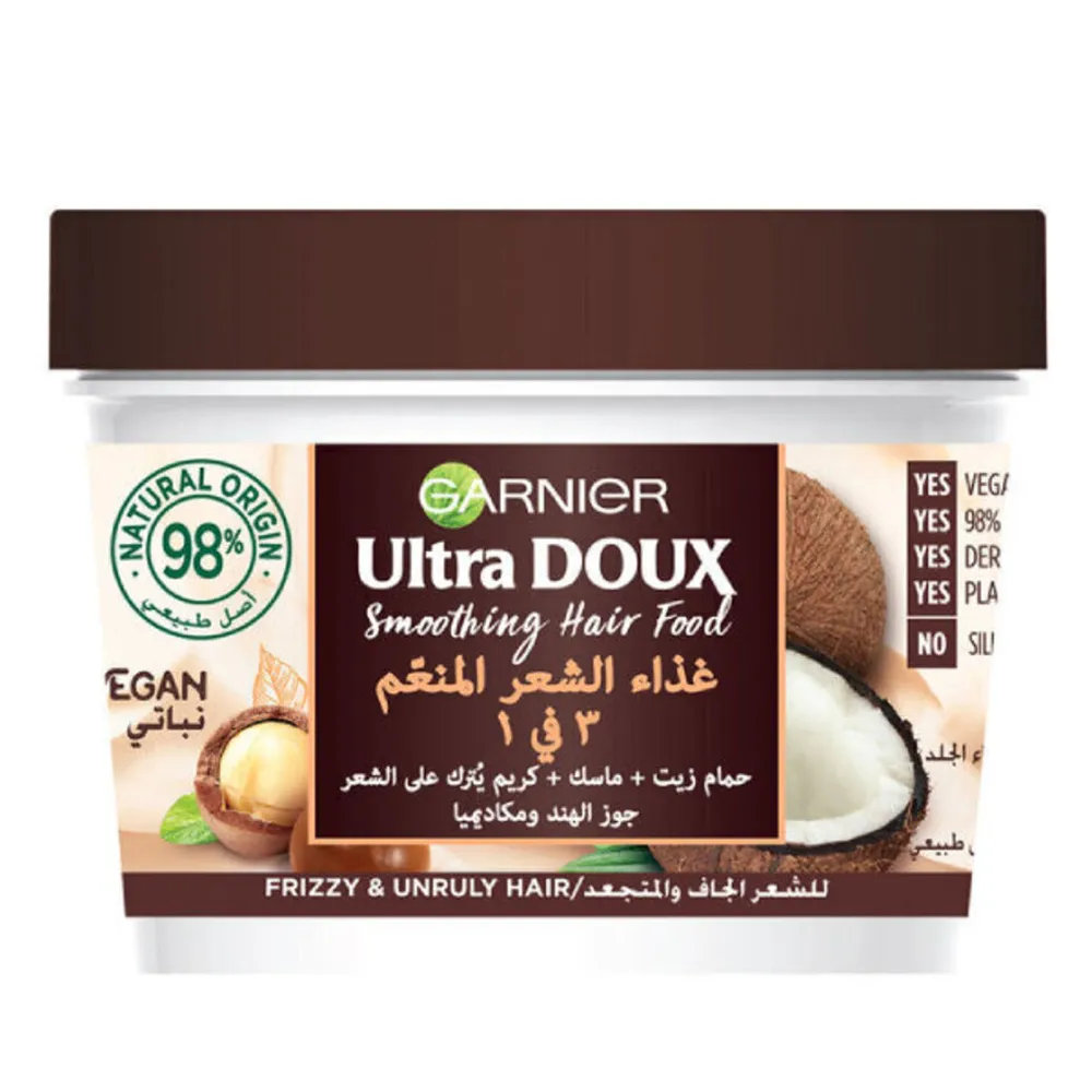 GARNIER-ULTRA-DOUX-MASK-SMOOTHING-HAIR-FOOD-3-IN-1-COCONUT-AND-MACADAMIA-FRIZZY-UNRULLY-HAIR-390-ML.webp غارنييه الترا دوكس ماسك الشعر غذاء الشعر المنعم 3*1 جوز الهند و المكاديميا للشعر الجاف و المجعد 390 مل - الصورة 1